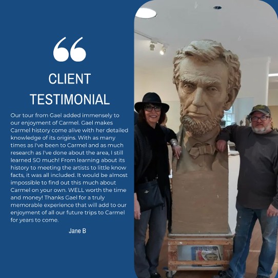 A happy couple posing with a large bust of Abraham Lincoln inside an art gallery, leaving a glowing review for Gael Gallagher’s Carmel tour.